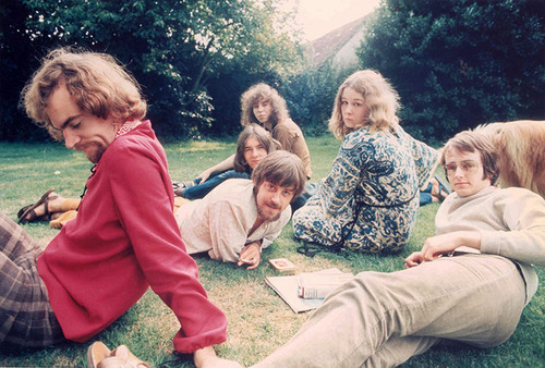 The band Fairport Convention circa 1969 in a group shot of them seated on the grass.