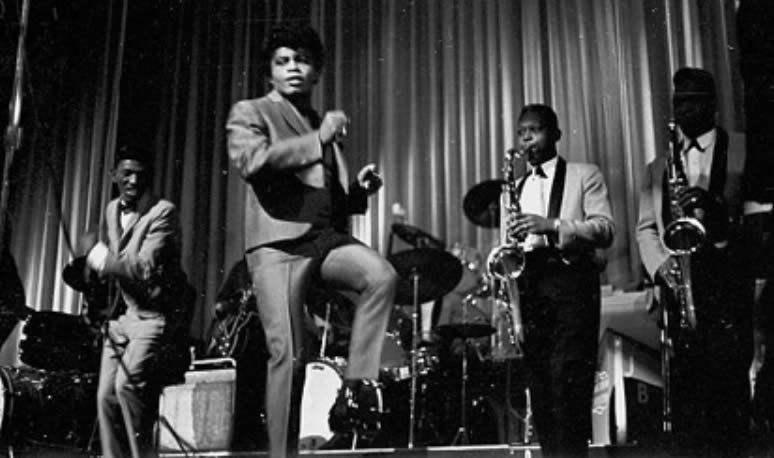 James Brown and band on stage at The Apollo