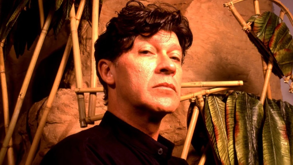 Headshot of singer / guitarist Robbie Robertson