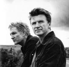 B&W photo of Tim and Neil Finn outdoors