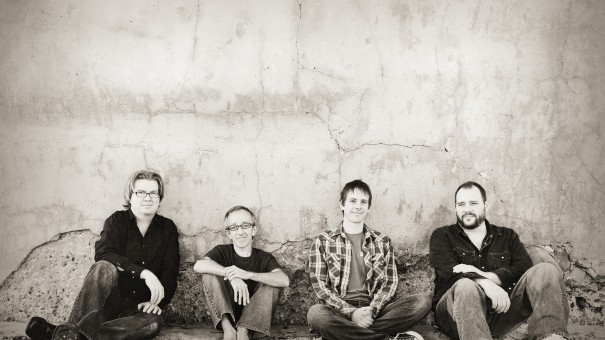 Group shot of the band Toad the Wet Sprocket -seated on ground