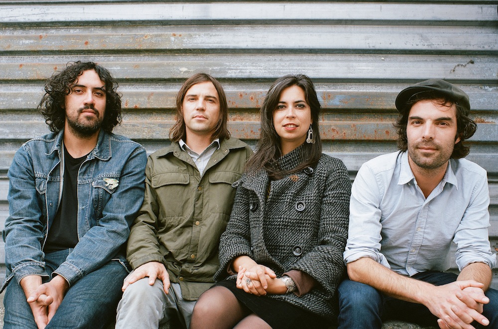 Group shot of The Barr Brothers seated outside