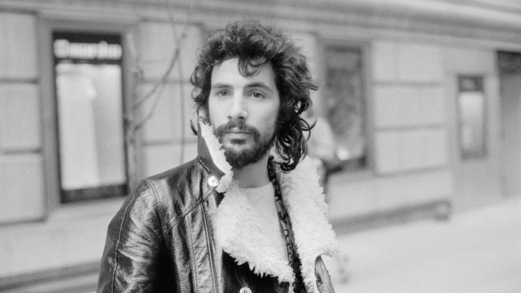Cat Stevens outside on street circa 1970