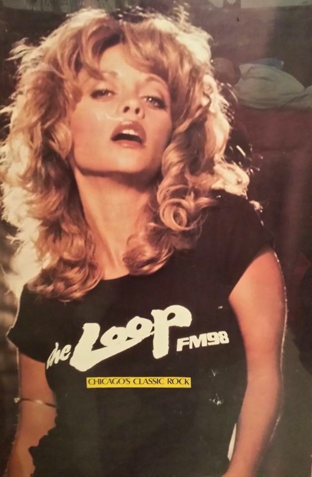 Poster photo of Lorelei modeling the WLUP Loop t-shirt during the late 70s 
