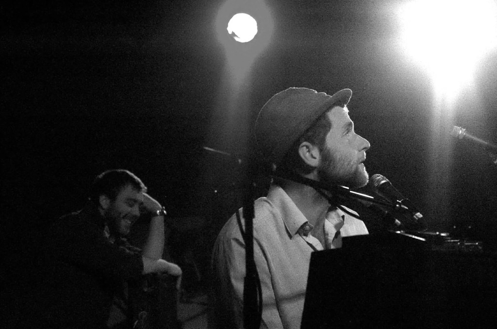 Singer David Ford seated at piano