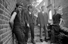 Group shot of the band Killing Joke outdoors