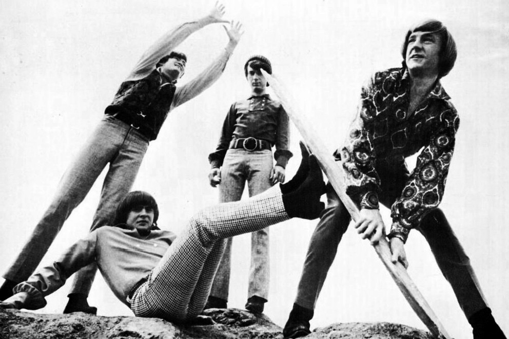 The Monkees group shot of them in playful poses