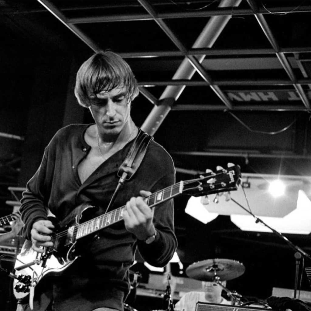 Paul Weller on stage with electric guitar circa 1993
