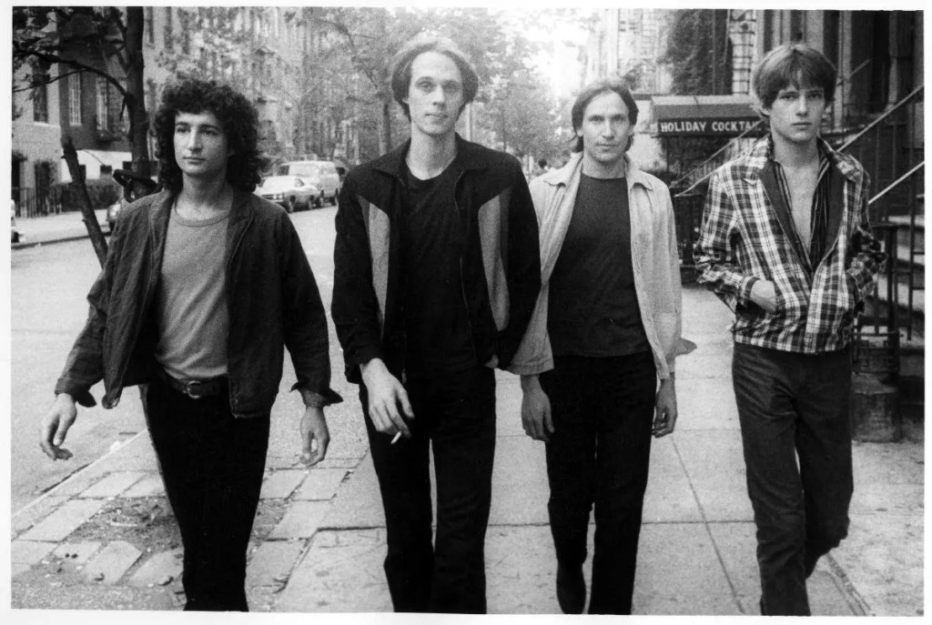 The band Television walking down a city street circa 1977